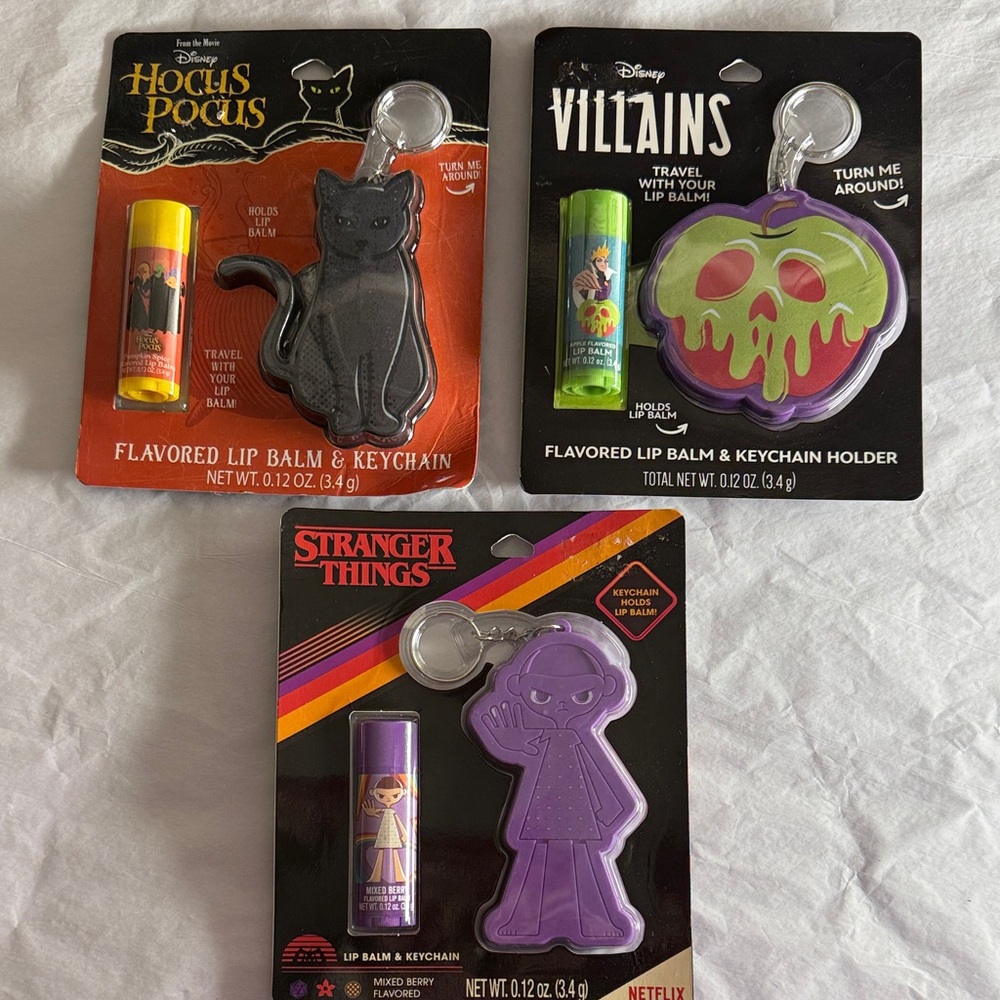 Disney and Netflix lot of 3 lip balm and keychain holder